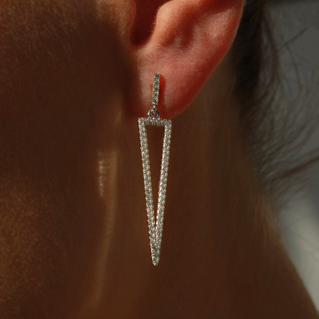 Sterling Silver Statement Drop Triangle earrings encrusted with sparkling CZ stones.