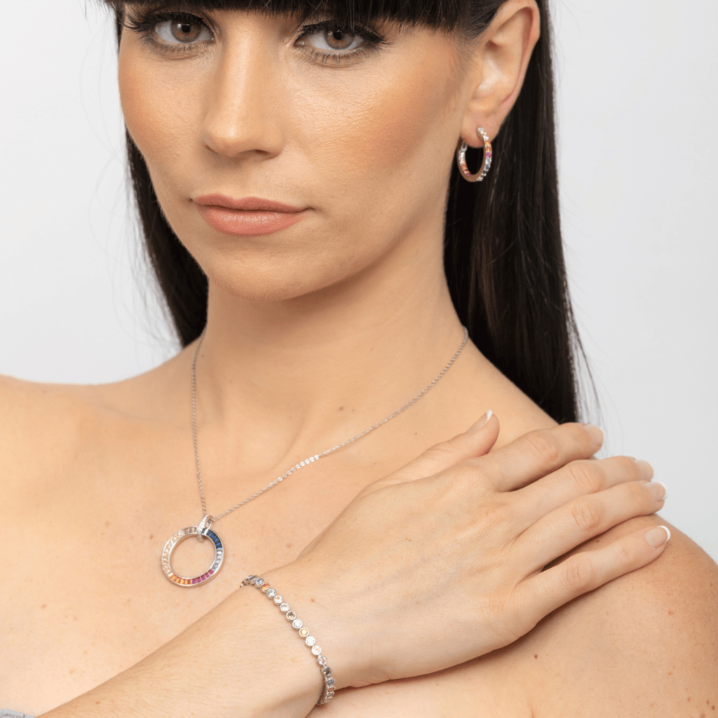 A stunning high polished finish circle necklace with shinning colours of the rainbow.