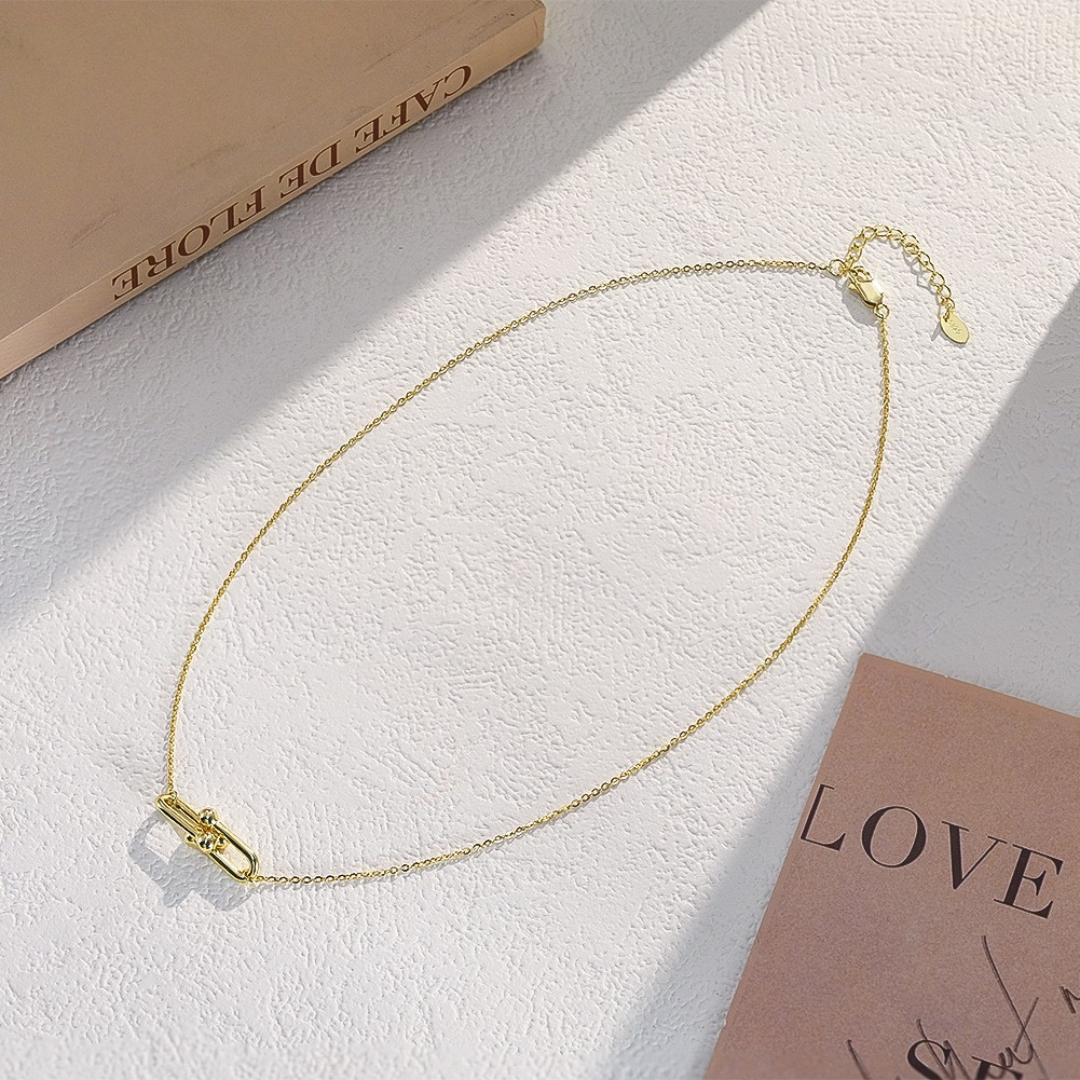 Gold Plated Link Pendant Necklace styled in a lifestyle setting, showcasing its elegant, contemporary look