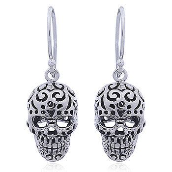 French hook skull style with intricate detail of eyes nose and mouth.