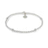 Sterling silver high polish finish ball bead stretch bracelet.