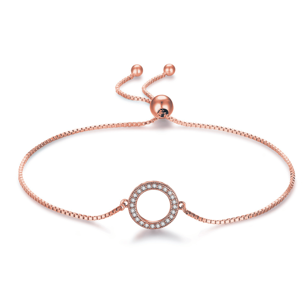 Rose gold sparking one strand slider bracelet featuring a circle of cubic zirconia stones.