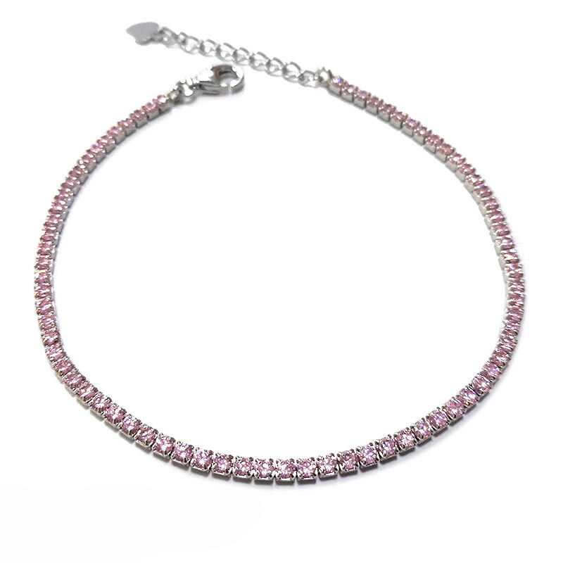 A quality tennis bracelet with pink shiny cubic zirconia stones made from 925 silver.