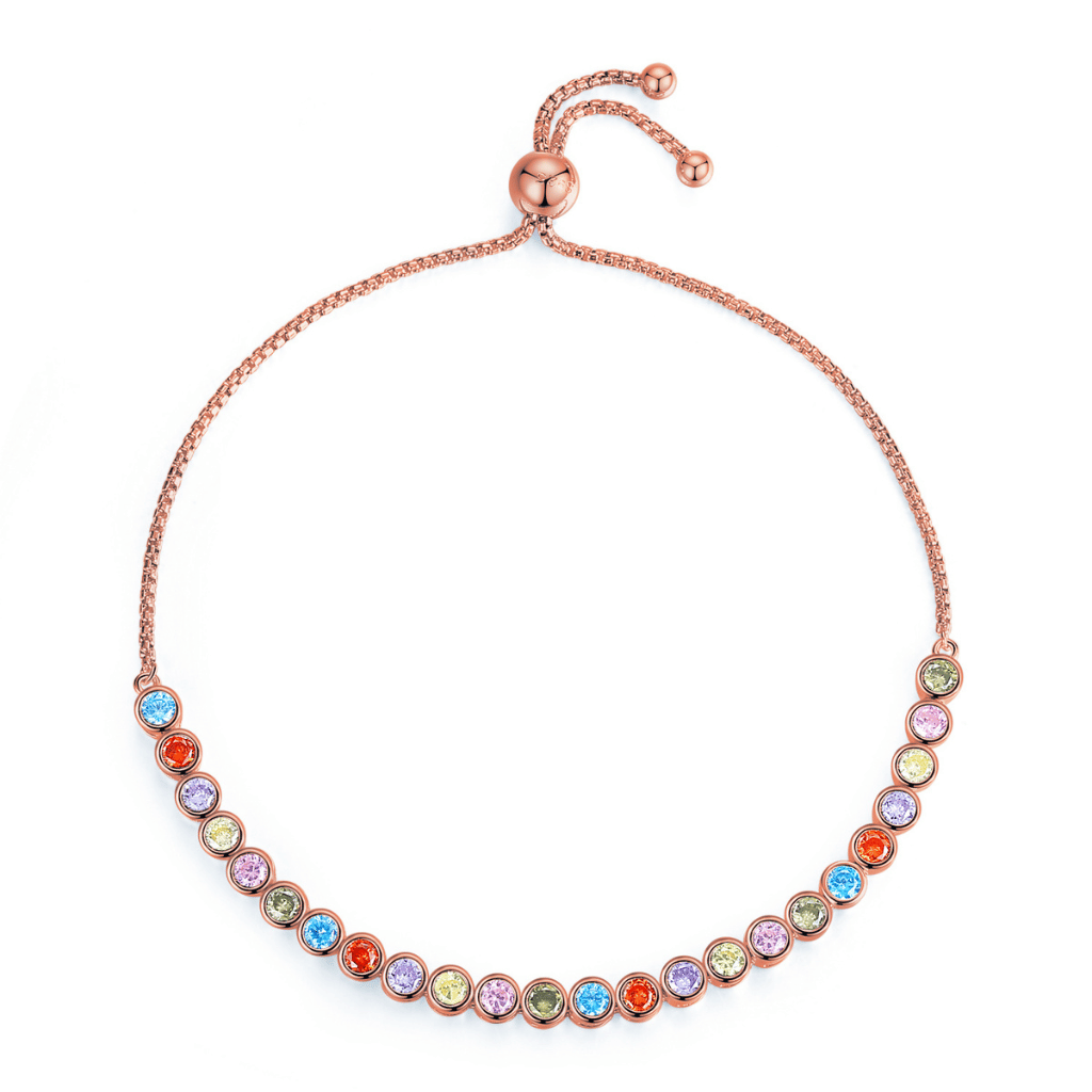A slider bracelet made from Rose Gold featuring circle coloured cubic zirconia stones in a tennis style.