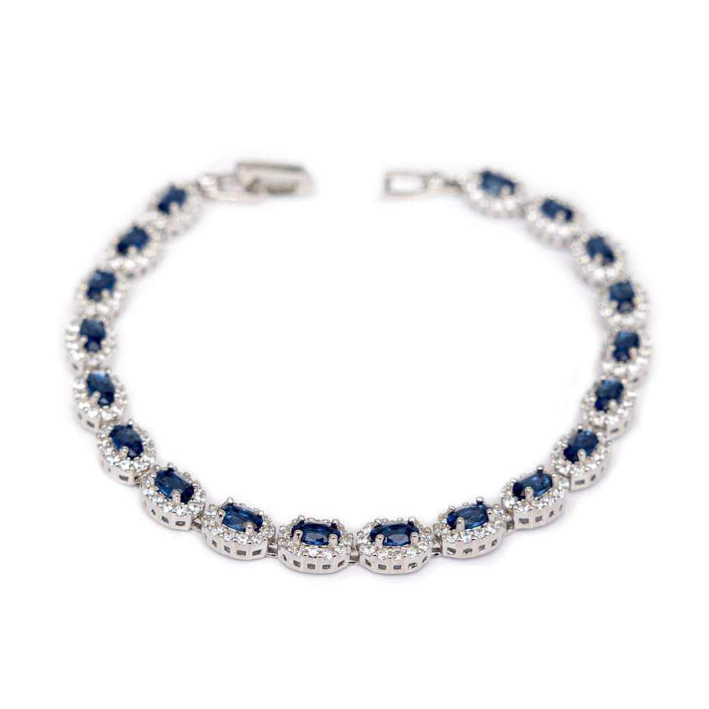 Sterling Silver tennis bracelet with oval shape blue sapphire CZ stones. 