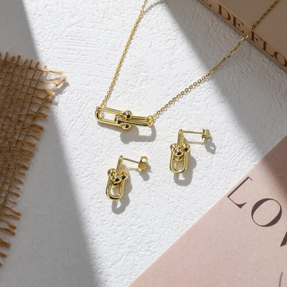 Gold Plated Link Pendant Necklace shown with matching Gold Plated Link Stud Earrings for a coordinated modern look