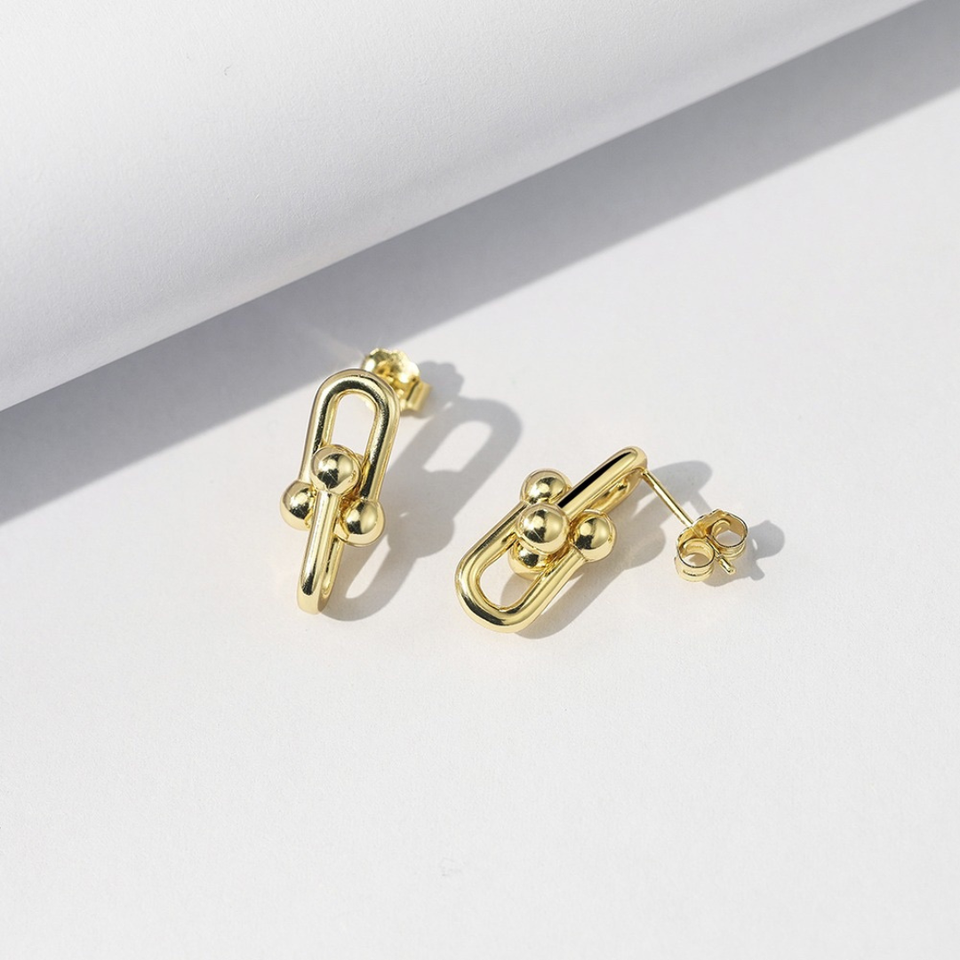 Gold Plated Link Stud Earrings styled in a lifestyle setting