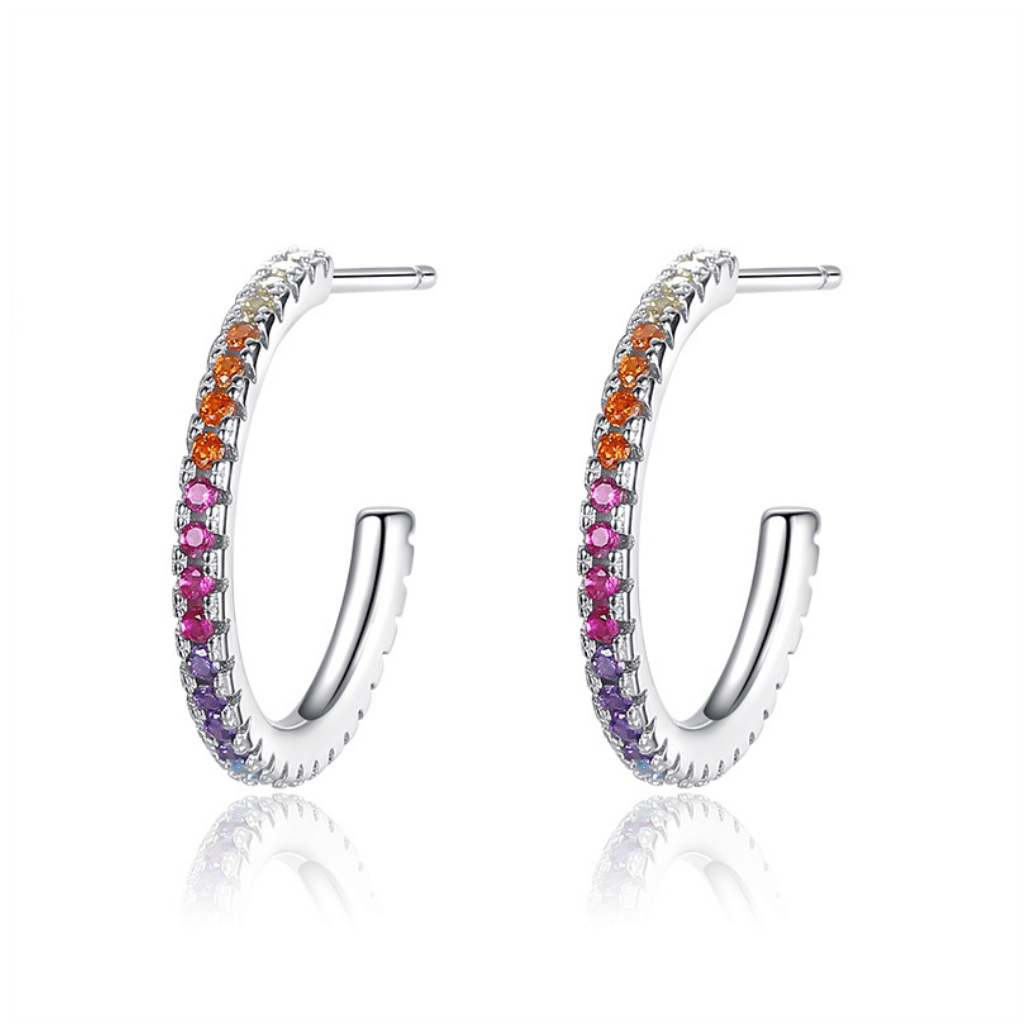 Sparkling cubic zirconia gemstones encrusted in a hoop earrings.