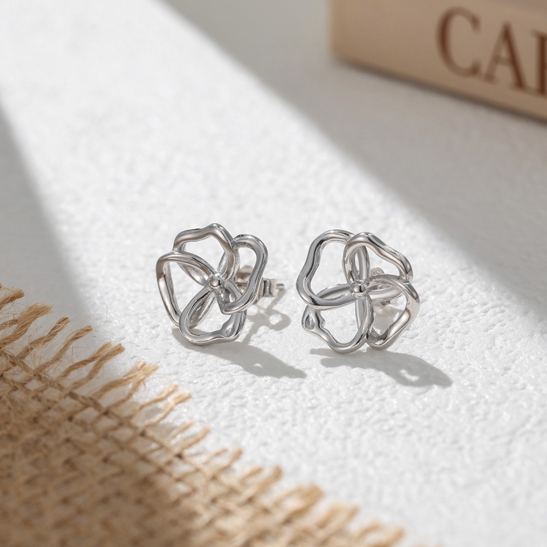 Close up of Sterling Silver Bloom Abstract Stud Earrings
