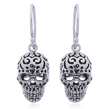 French hook skull style with intricate detail of eyes nose and mouth.