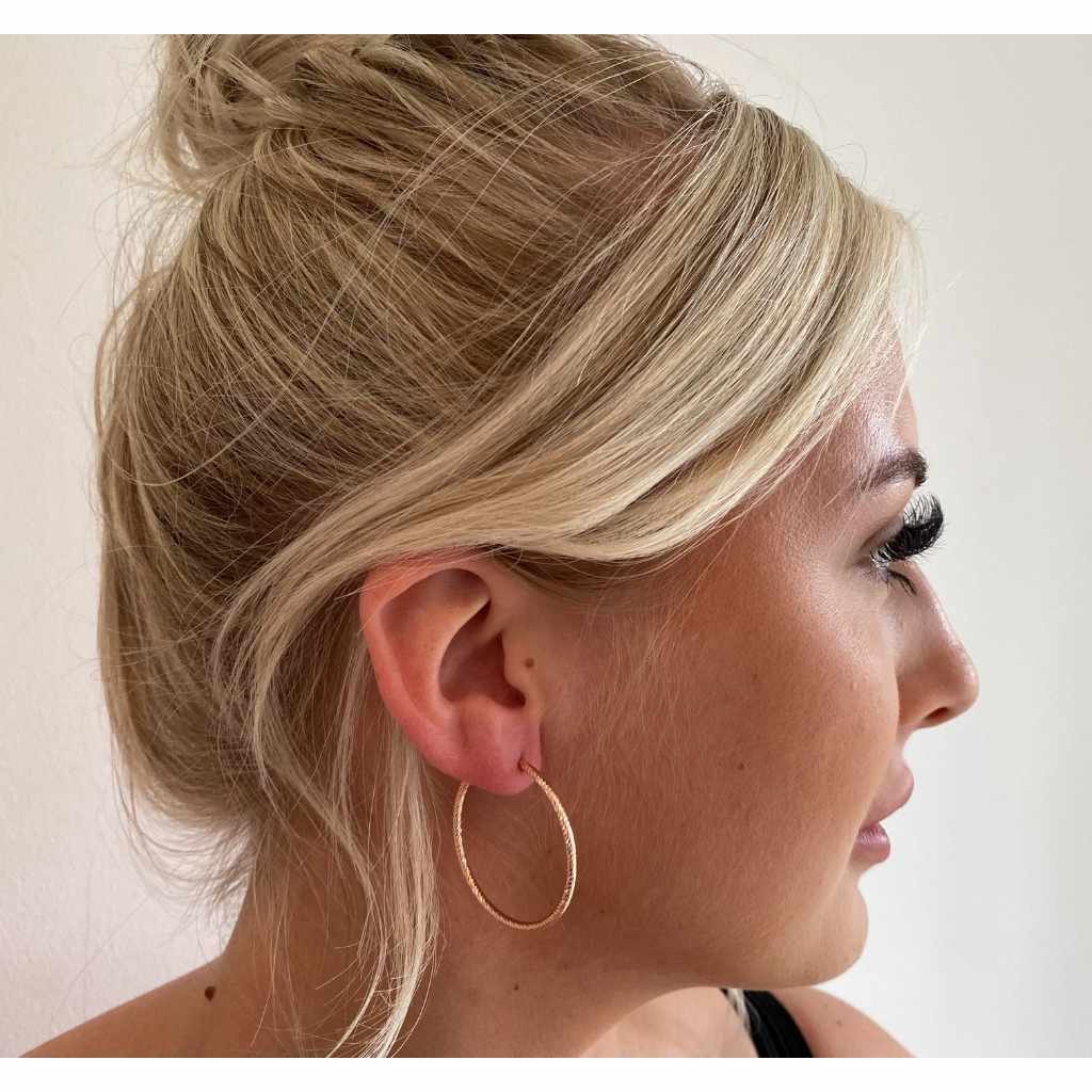 Rose Gold Big Hoop Diamond Cut Earrings on blonde model.