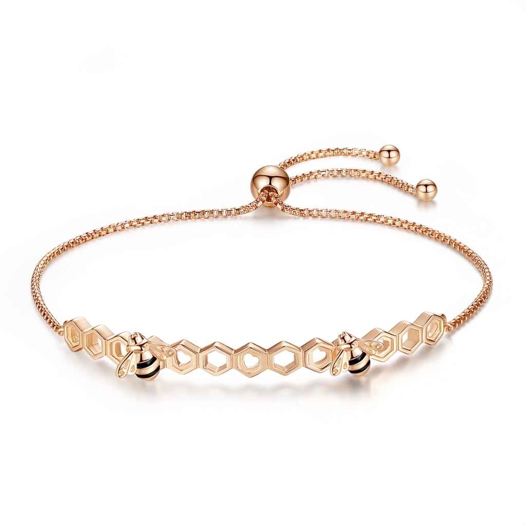Two detailed bees on honeycomb bracelet crafted in Rose Gold.