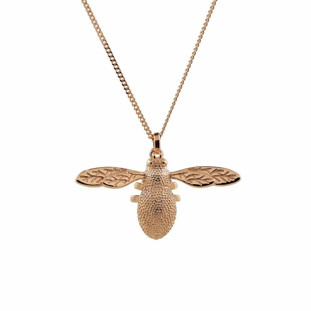 Three dimensional rose gold bee necklace with intricate detail.