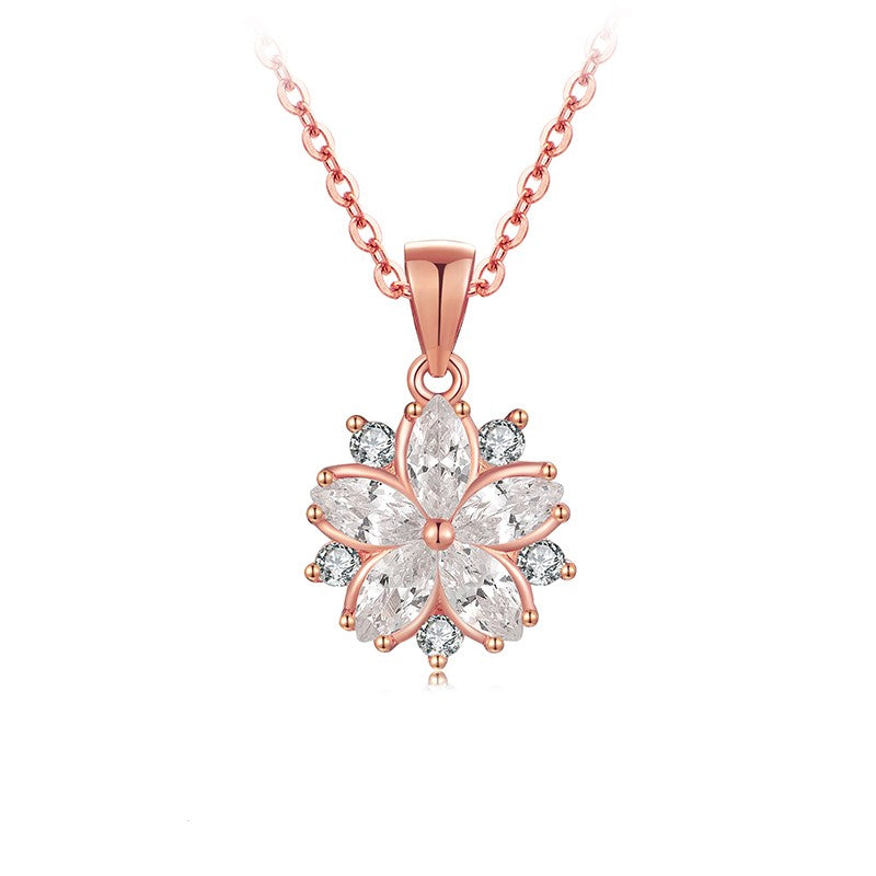 Cubic zirconia stones make up a stunning shape flower on a stunning rose gold chain.