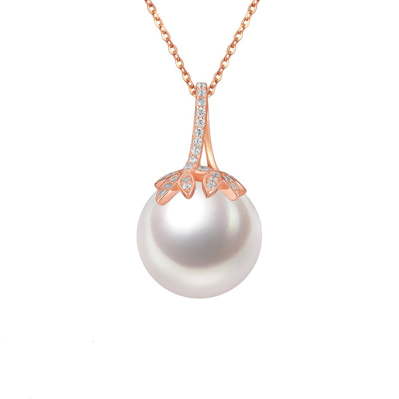 A shiny pearl on a rose gold chain. A stunning necklace.