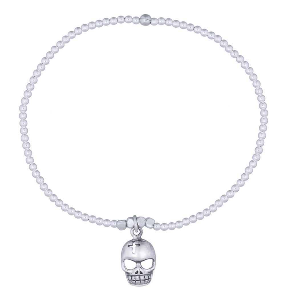 Skull charm in sterling silver on a bead stretch bracelet.