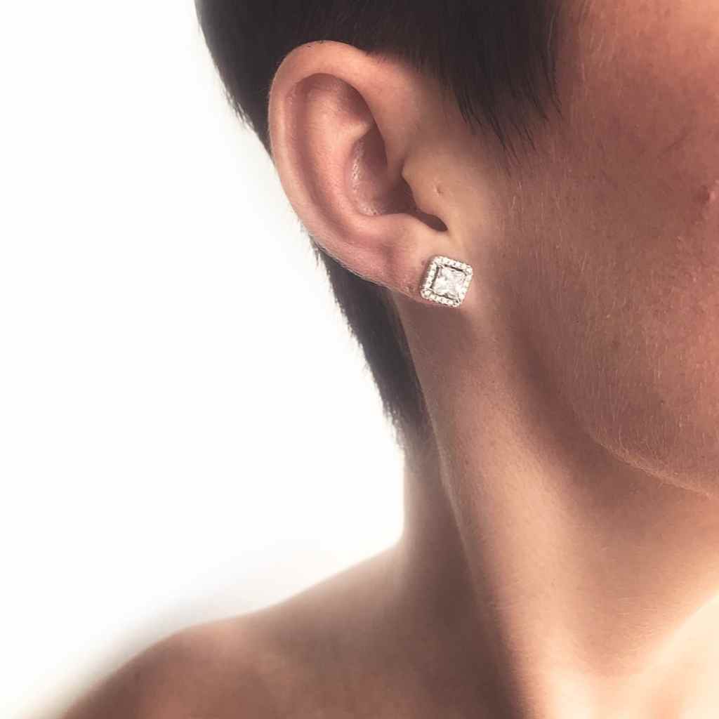 Brilliant Cubic Zirconia square stud earrings.